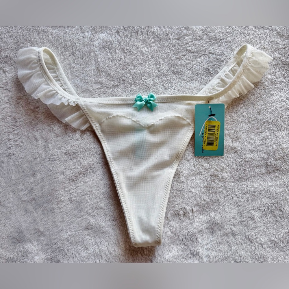 Betsey Johnson Cream Ruffle Trim Thongs with Aqua Bow